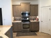 Knotty-Alder-Refinished-to-Greige-Toned-Kitchen